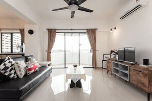 Apartamento, 3 quartos, para não fumantes | Área de estar | TV de tela plana