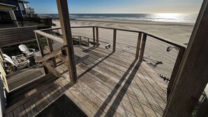 A wooden deck with a view of the beach and ocean. - Oceanfront, Private Beach Access, Newly Updated, Perfect for Family Gatherings! (Lincoln City)