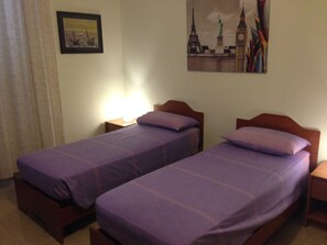 Frette Italian sheets, premium bedding, down duvets, desk