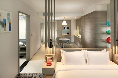 Premium bedding, in-room safe, desk, laptop workspace. Capri by Fraser Johor Bahru