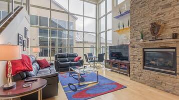 Flat-screen TV, fireplace, video games, DVD player