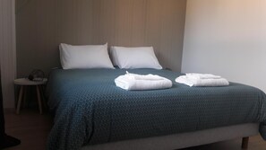 Ropa de cama de alta calidad y cortinas blackout