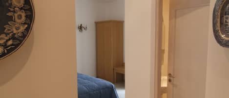 Standard Triple Room, 1 Bedroom, Balcony | Room amenity