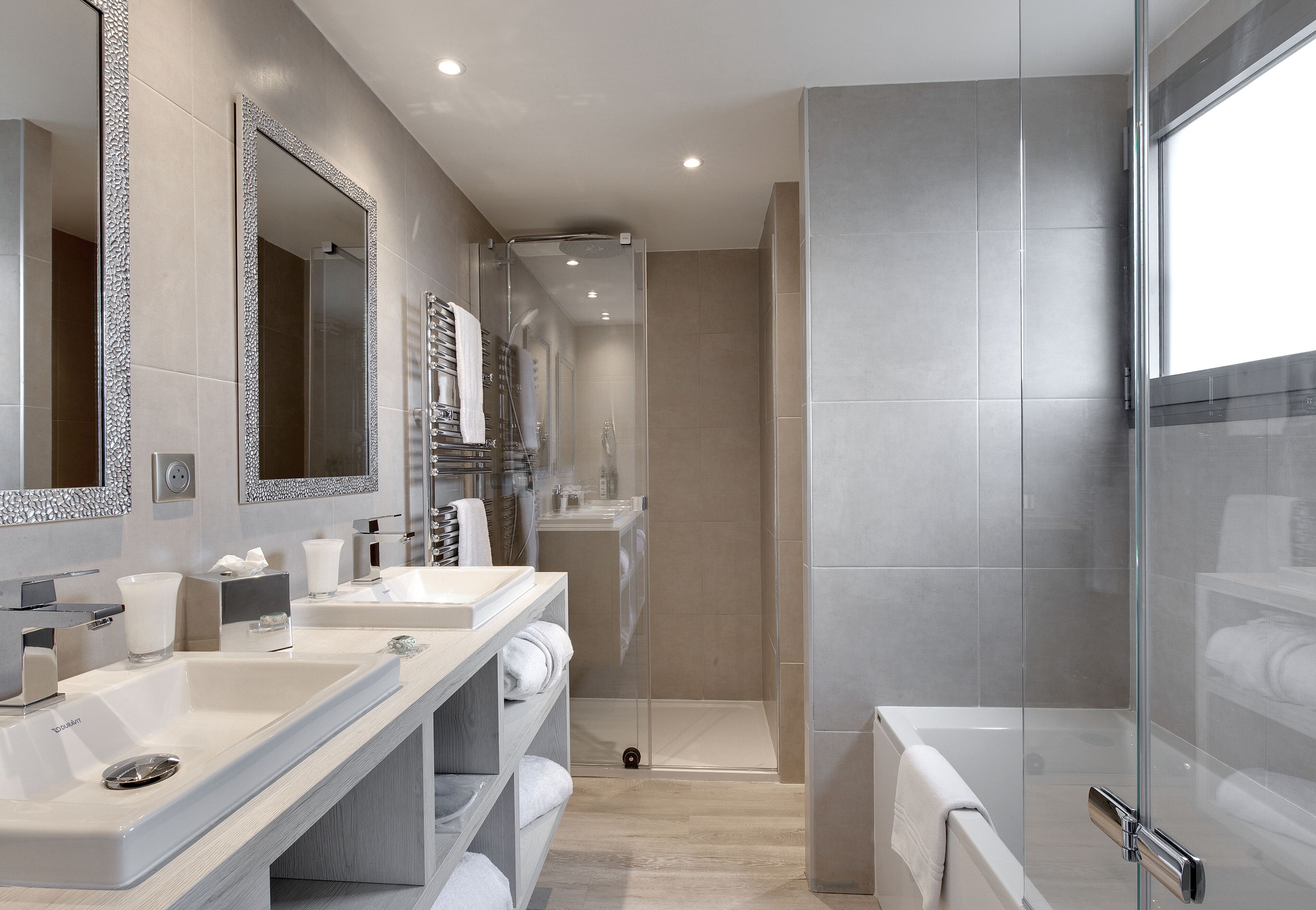 designer toiletries, hair dryer, bathrobes, slippers