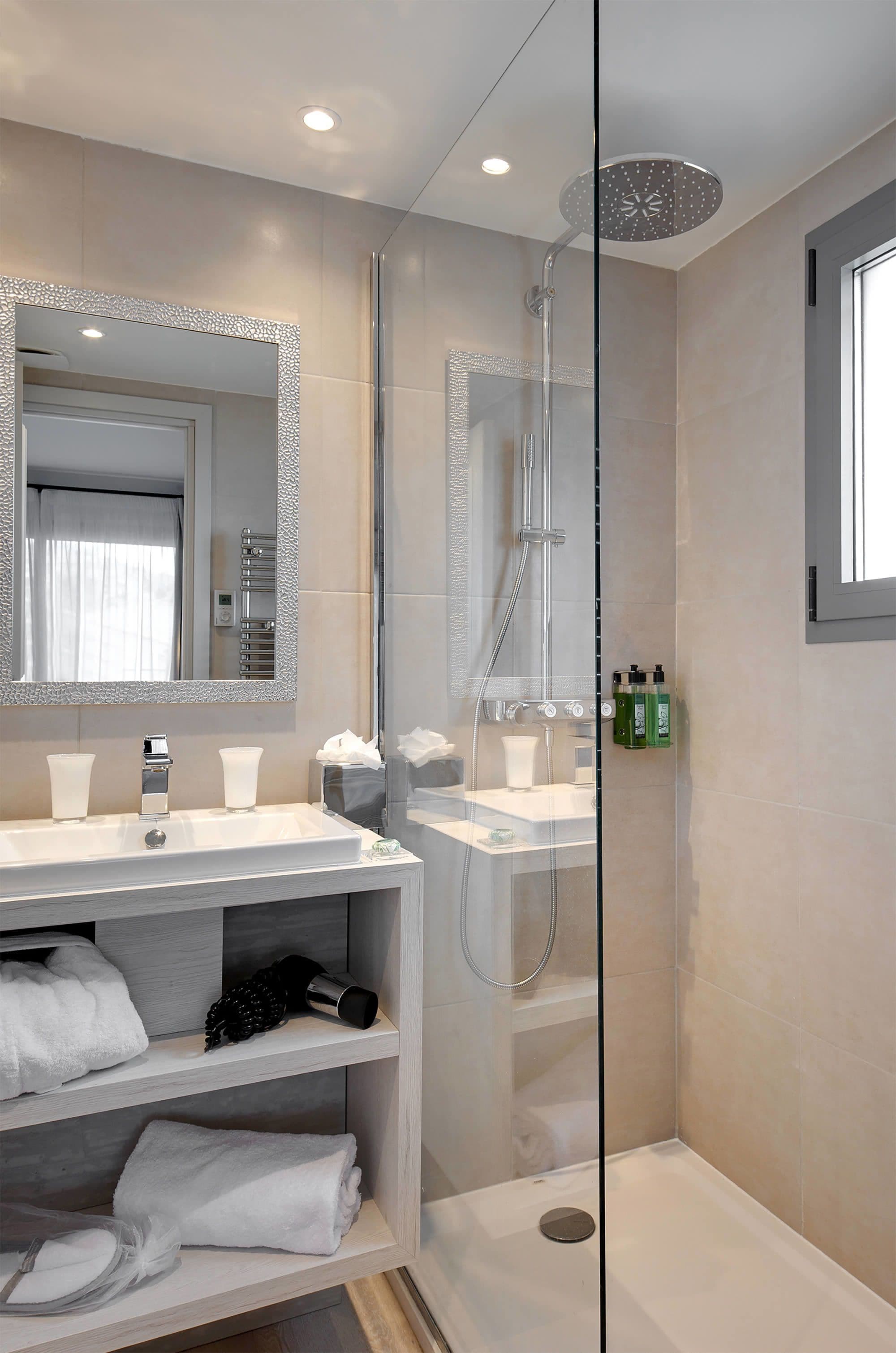 designer toiletries, hair dryer, bathrobes, slippers