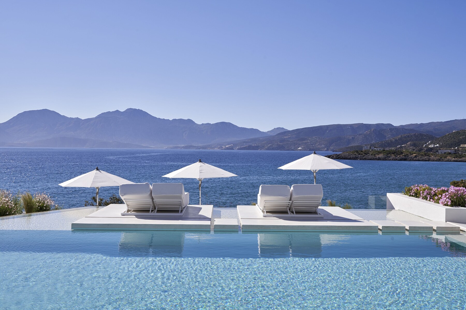 Seasonal outdoor pool, pool umbrellas, pool loungers