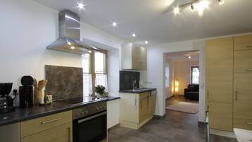 Apartment, 1 Bedroom, Patio, Garden View | Private kitchen | Fridge, oven, stovetop, dishwasher