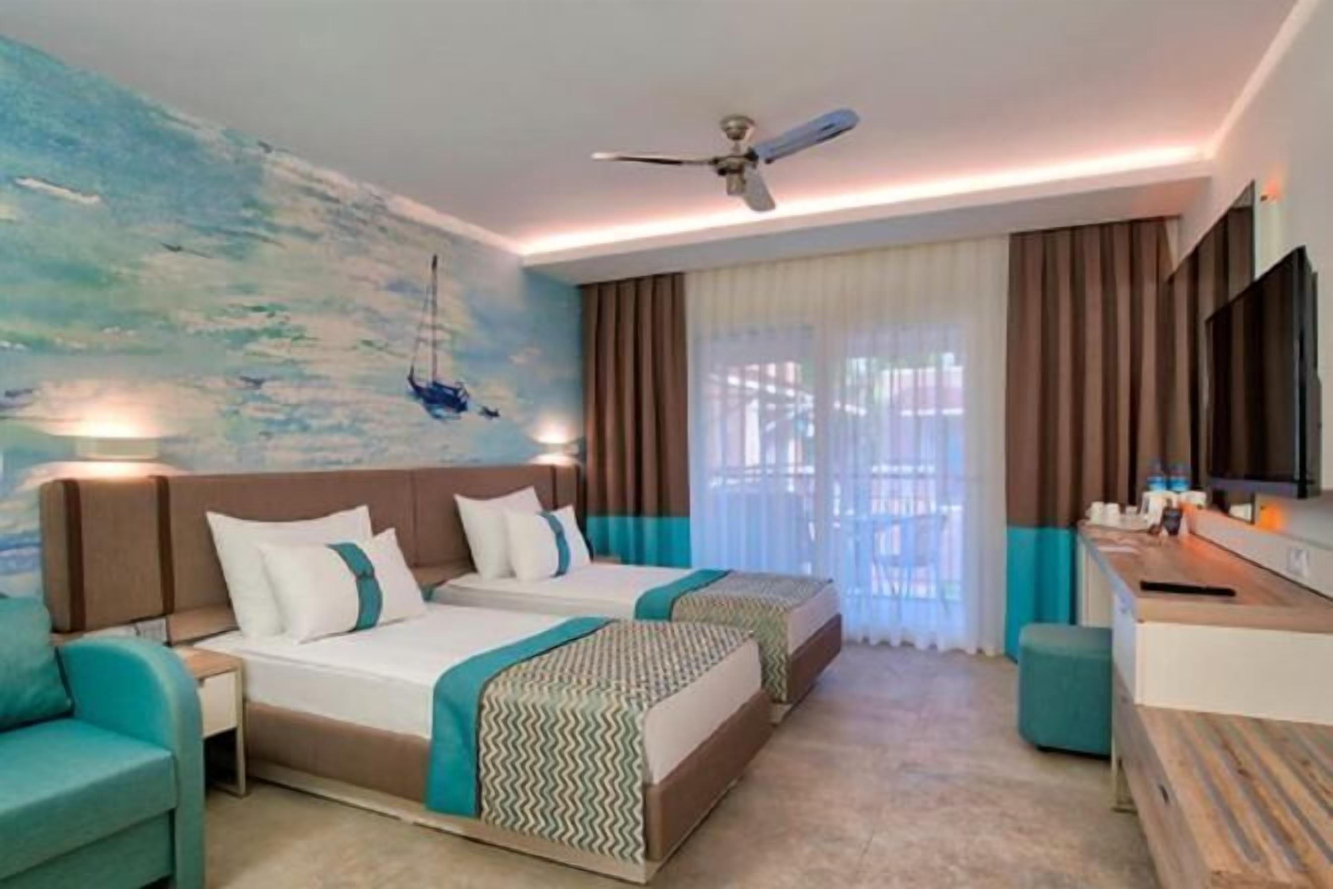 Free minibar, in-room safe, desk, blackout curtains