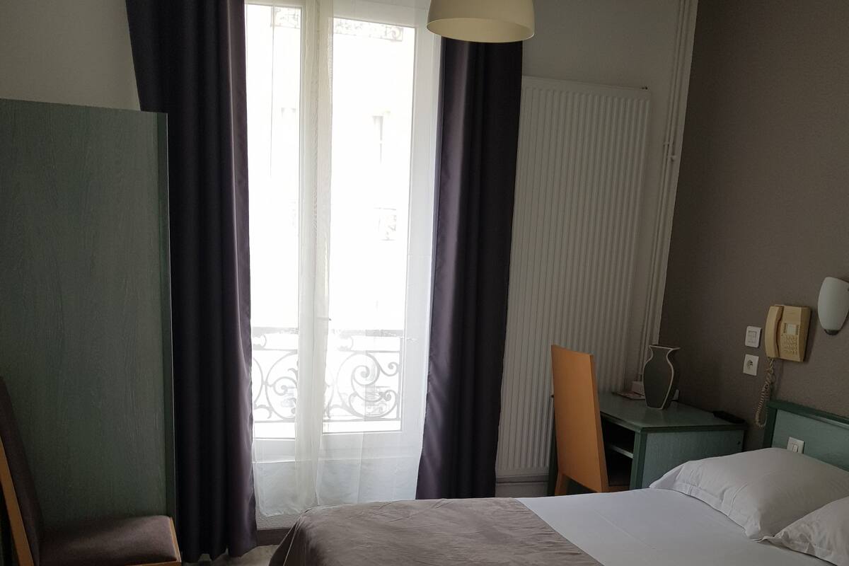 Classic Double Room, 1 Queen Bed, City View | Blackout drapes, WiFi (free), individually decorated