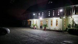A building with a traditional architectural style, featuring a gabled roof and multiple windows. - Leleshwa Getaway (Nairobi)