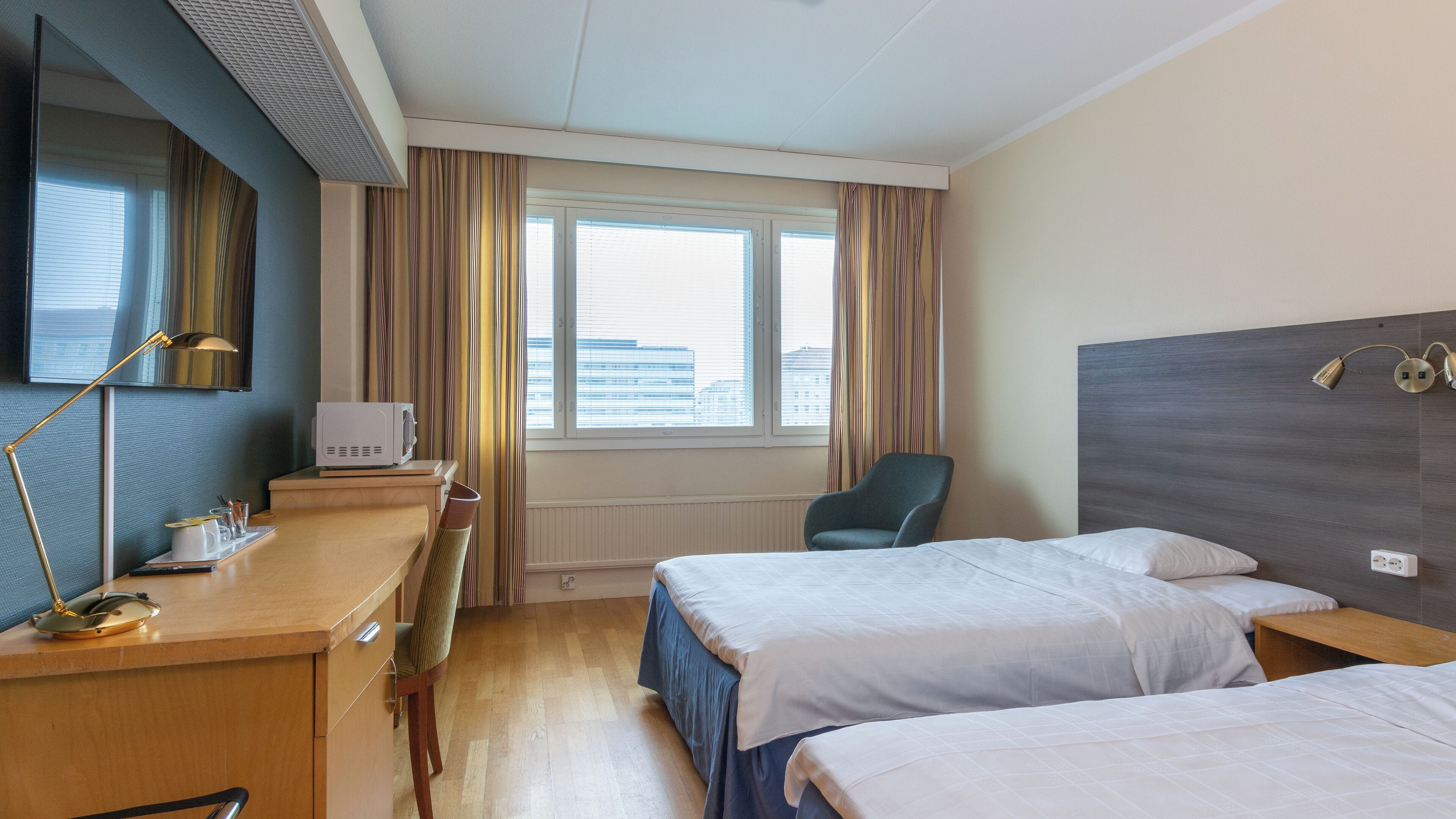 Economy Double or Twin Room, Non Smoking | Desk, laptop workspace, blackout drapes, iron/ironing board