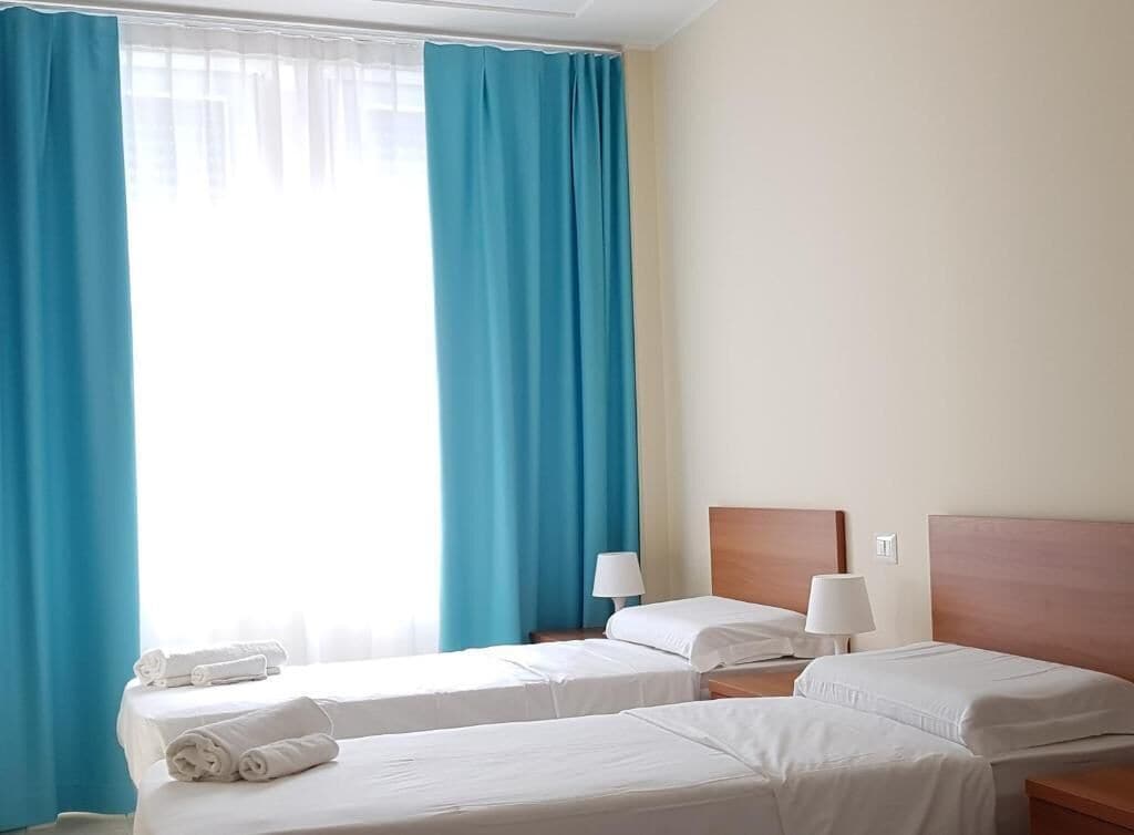 Down duvets, desk, blackout curtains, iron/ironing board