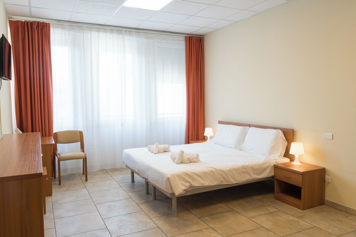 Superior Double or Twin Room | Down comforters, desk, laptop workspace, blackout drapes