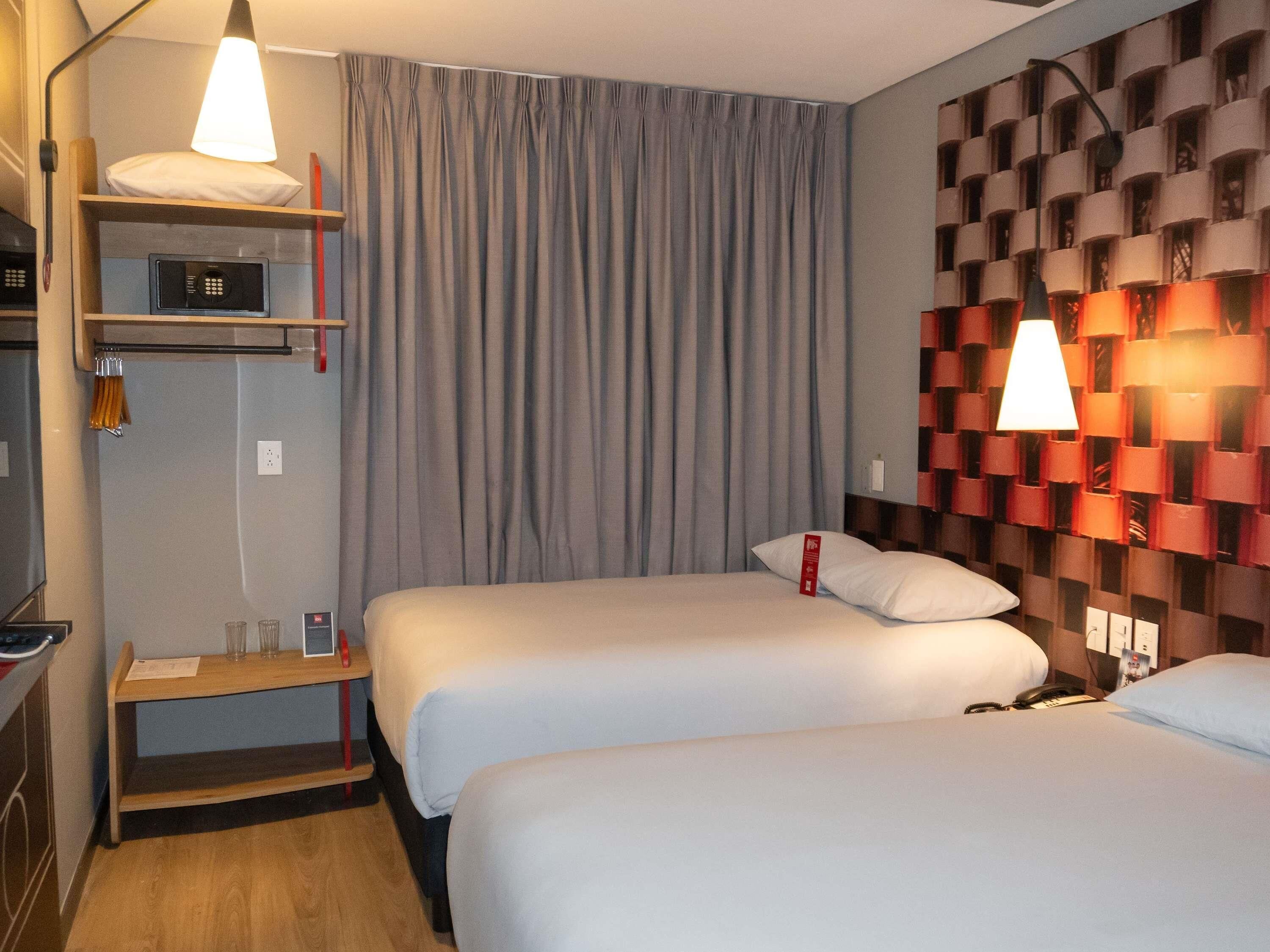 Premium bedding, down duvets, in-room safe, desk