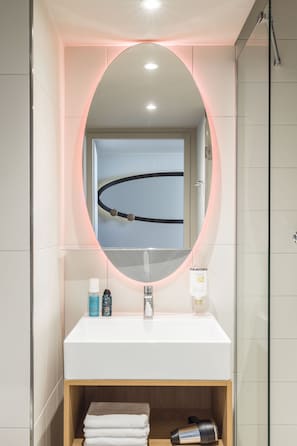Shower, eco-friendly toiletries, hair dryer, towels