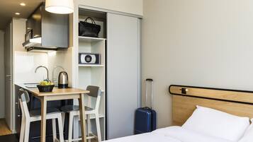 In-room safe, individually decorated, laptop workspace