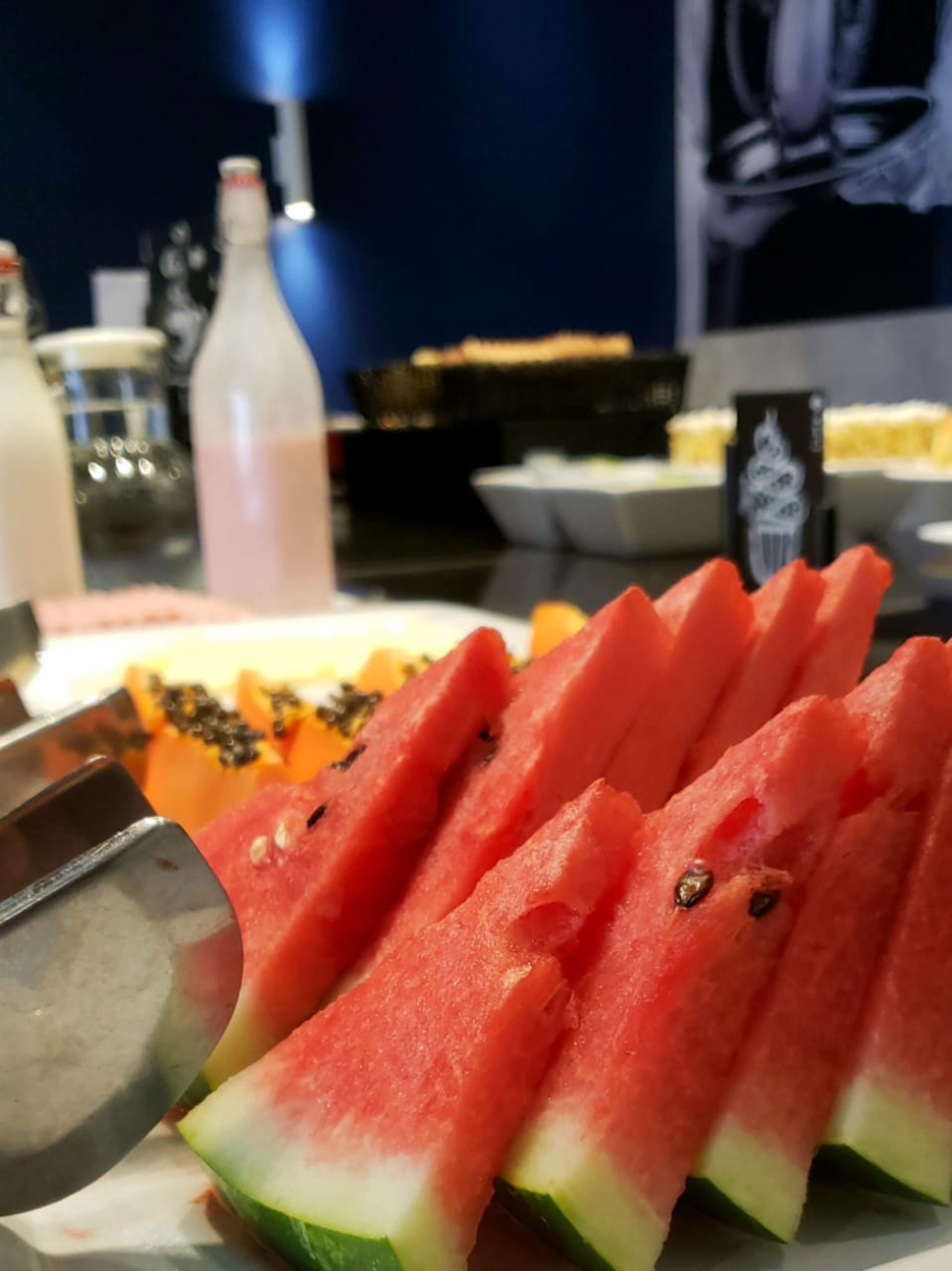 A close-up of watermelon slices on a plate.