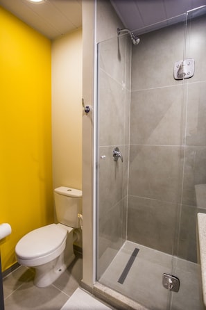 Shower, rainfall showerhead, eco-friendly toiletries, towels