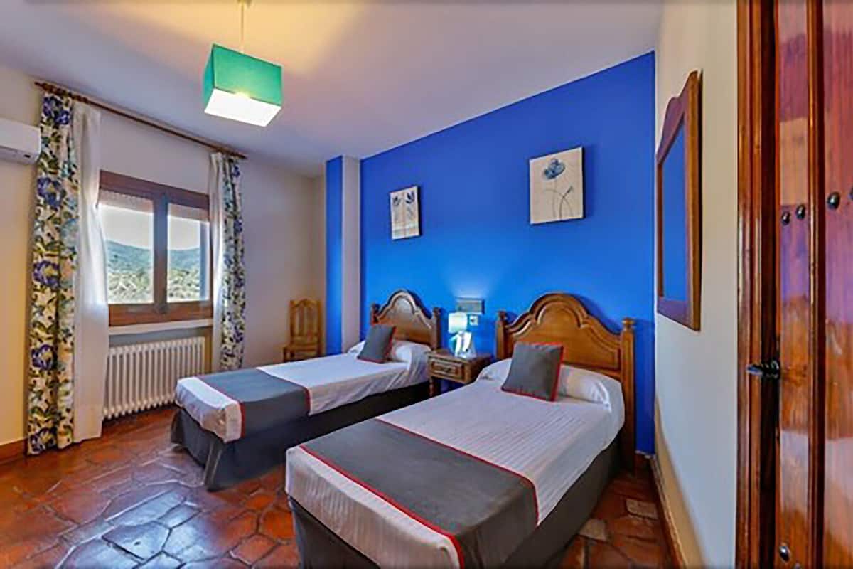 Desk, free WiFi, bed sheets