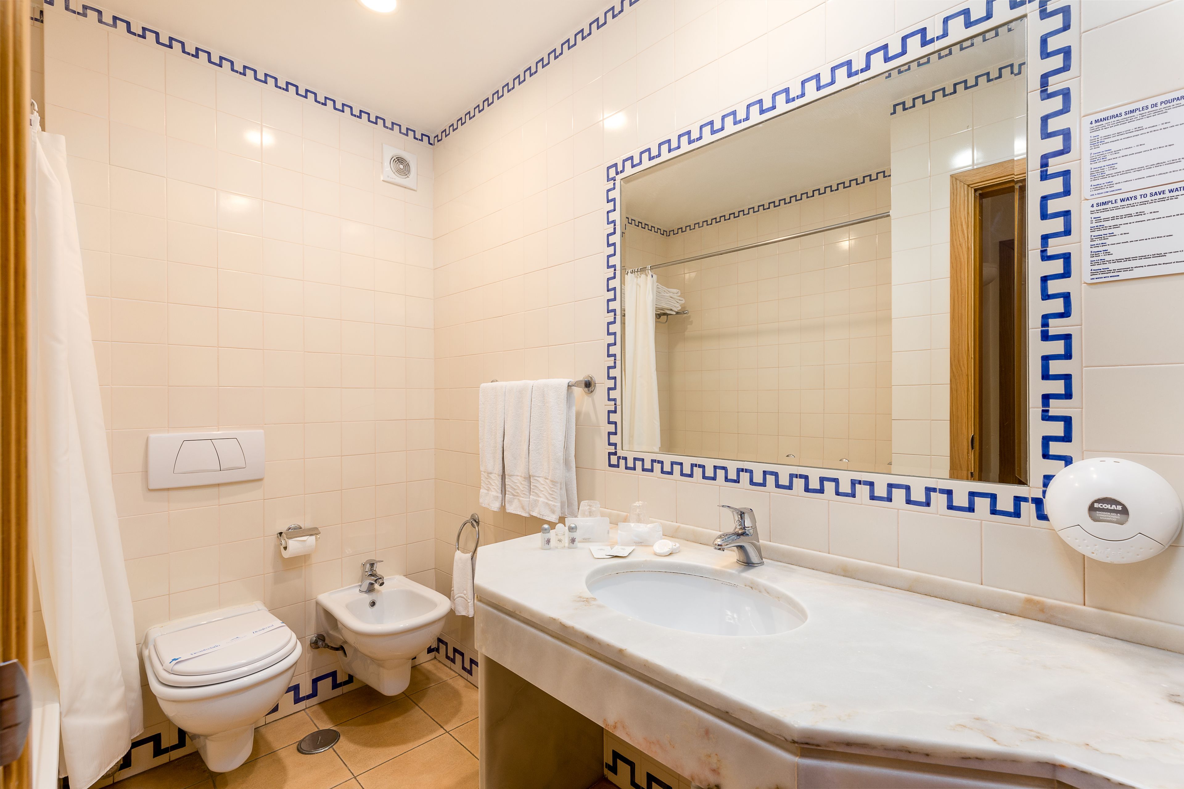 free toiletries, hair dryer, bidet, towels