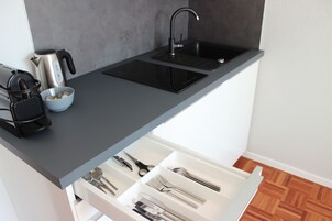 Full-size fridge, microwave, stovetop, espresso maker