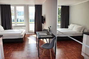 Hypo-allergenic bedding, individually furnished, laptop workspace