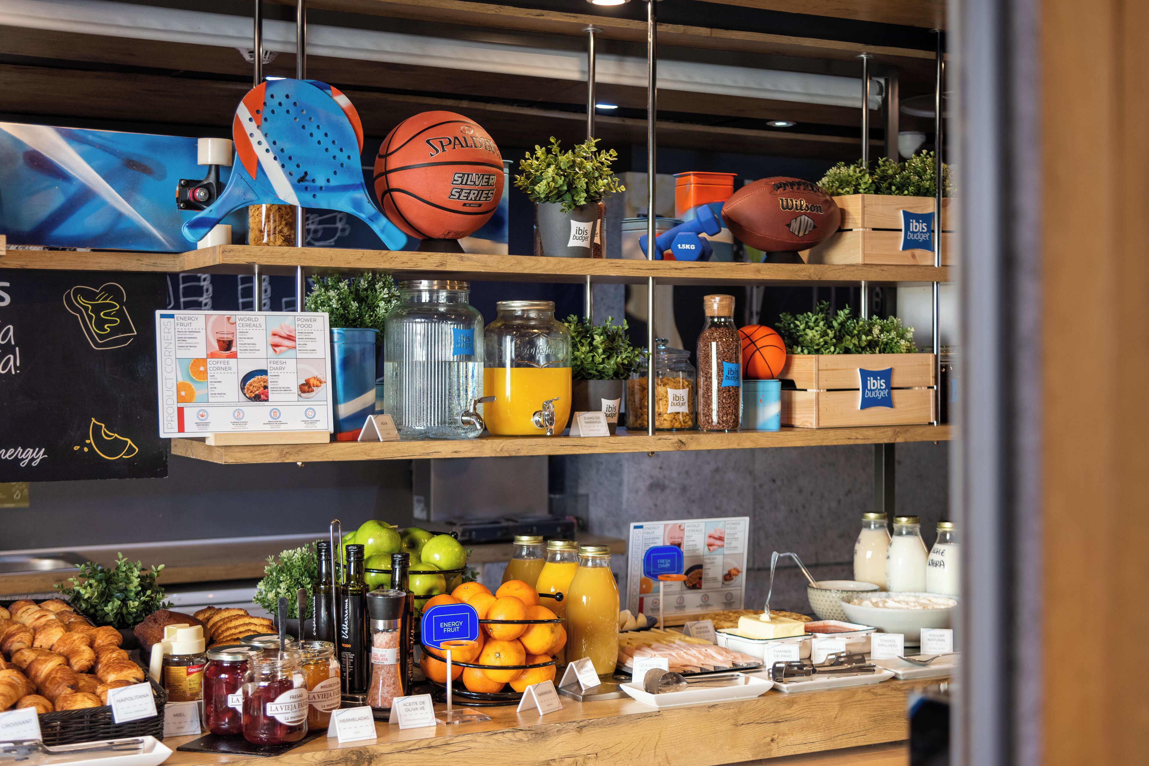 A breakfast buffet with various food items and beverages.