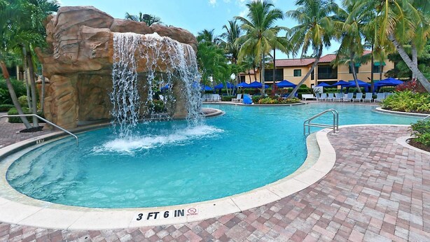 Apartment | Pool waterfall - The Art of Modern  Living - Oversized Condo Apartment 3 BestStayz.1 (Naples)