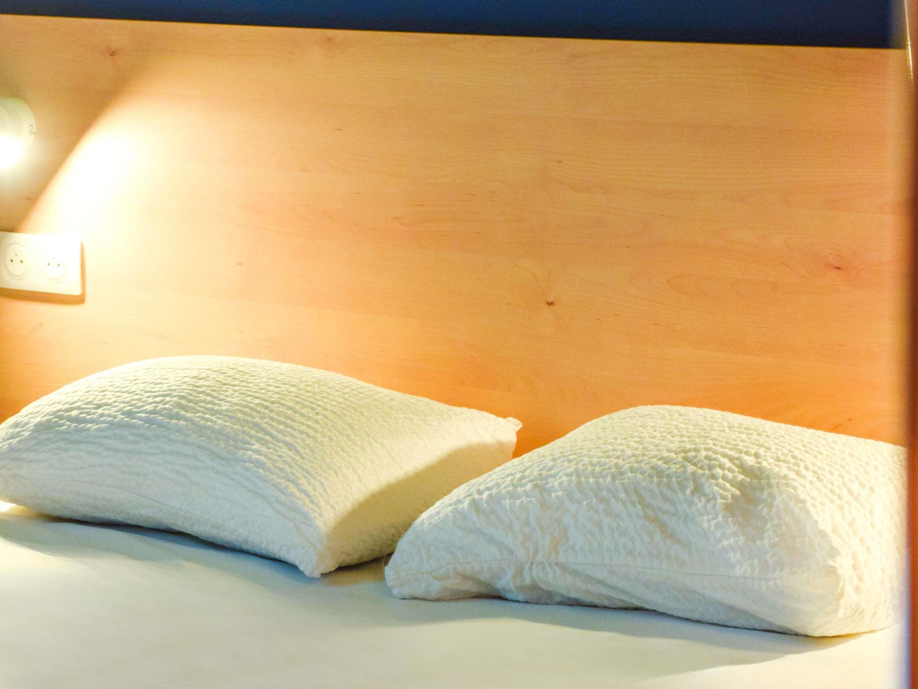 Premium bedding, Tempur-Pedic beds, desk, laptop workspace