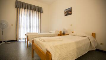 Twin Room, Private Bathroom | Blackout drapes, free WiFi, bed sheets
