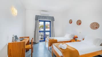 Basic Quadruple Room | Blackout drapes, free WiFi, bed sheets