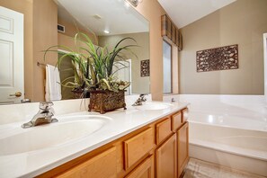 Combined shower/tub, hair dryer, towels, soap