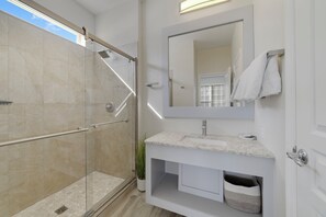 Combined shower/tub, hair dryer, towels, soap