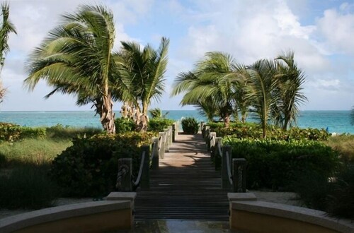  Magical Oceanfront Holiday in bester Lage am Grace Bay Beach - 1 oder 2 Schlafzimmer