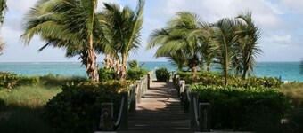 SPECIAL DISCOUNTED RATE!-  Magical Oceanfront Holiday - Grace Bay Beach 1/2 bed