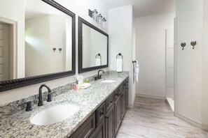 Combined shower/tub, hair dryer
