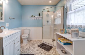 Combined shower/tub, hair dryer, towels, soap