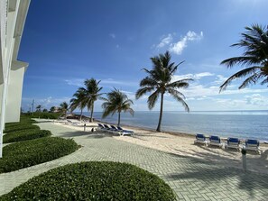 On the beach, sun-loungers, beach towels