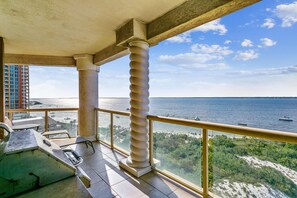Enjoy unobstructed views of the sea and shoreline from this balcony.