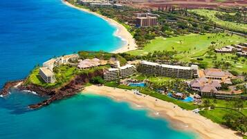 On the beach, sun-loungers, beach towels