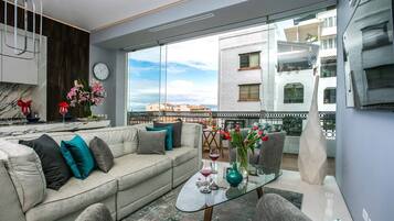 Smart TV, streaming services, music library, stereo