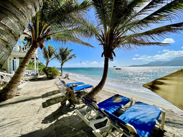 On the beach, sun-loungers, beach towels