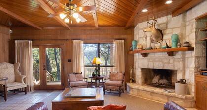 Jump right in the river at this gated, 2 acre Guadalupe Riverfront home!