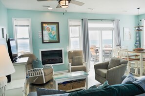TV, fireplace, DVD player, books - Sunflower Beach House | Oceanfront + Walk to Beach (Surf City)