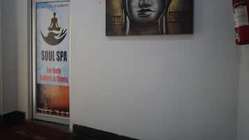Een poster voor Soul Spa, geopend van 10:00 tot 20:00, voor dames en heren.