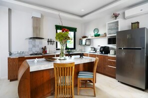 Fridge, microwave, cookware/dishes/utensils