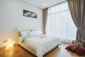 Apartment (TL tower view) | Living area | Flat-screen TV - Soho suites by 21 century (Kuala Lumpur)