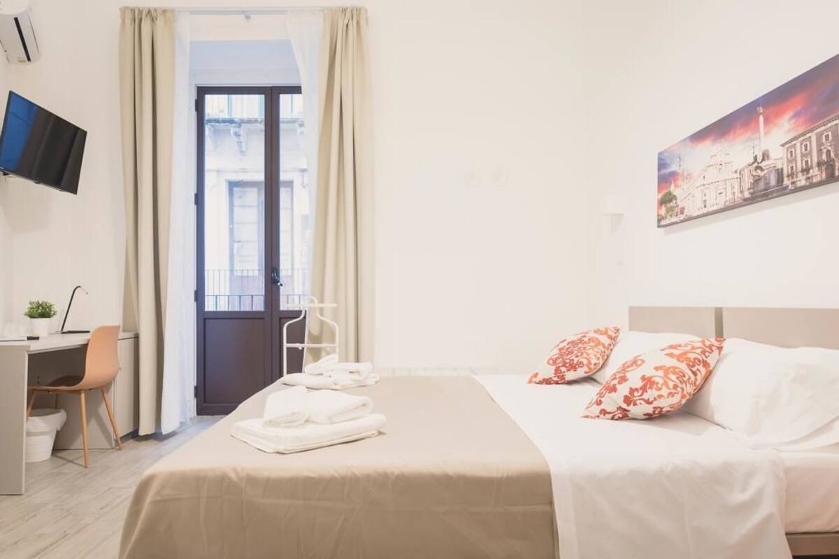 Standard Double or Twin Room | Minibar, in-room safe, desk, laptop workspace