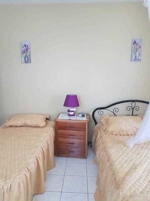 Double or Twin Room, 2 Twin Beds, Shared Bathroom | Iron/ironing board, bed sheets