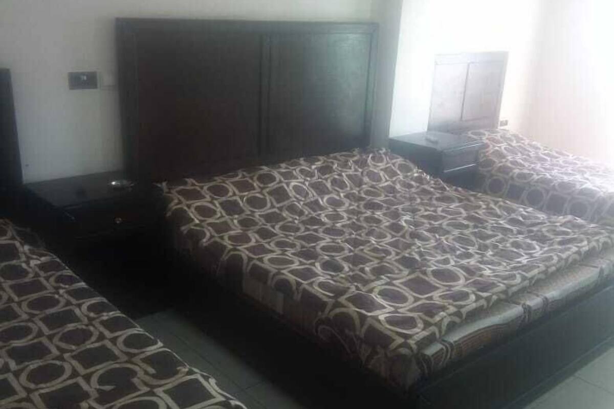 Traditional Quadruple Room, Multiple Beds, Smoking, Beach View | 2 bedrooms, blackout drapes, iron/ironing board (on request)